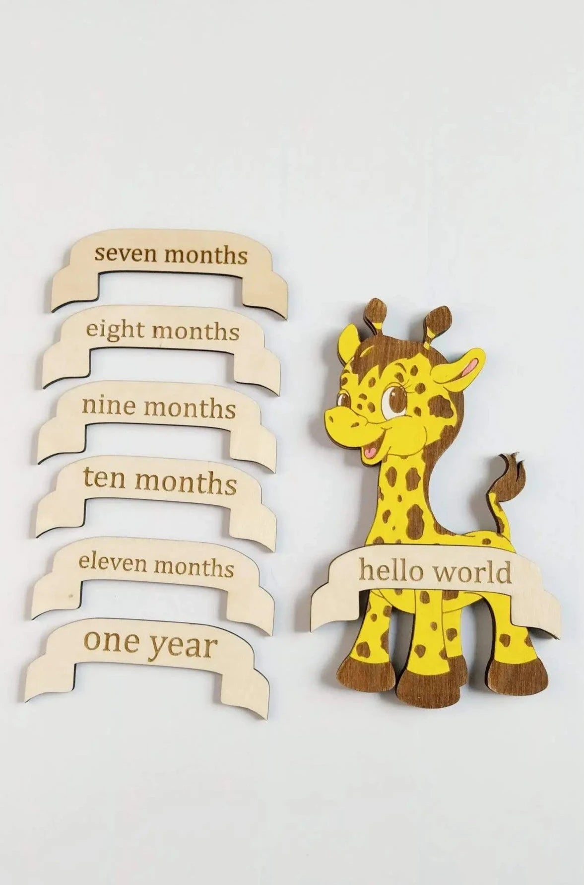 photo prop baby giraffe with milestone month markers