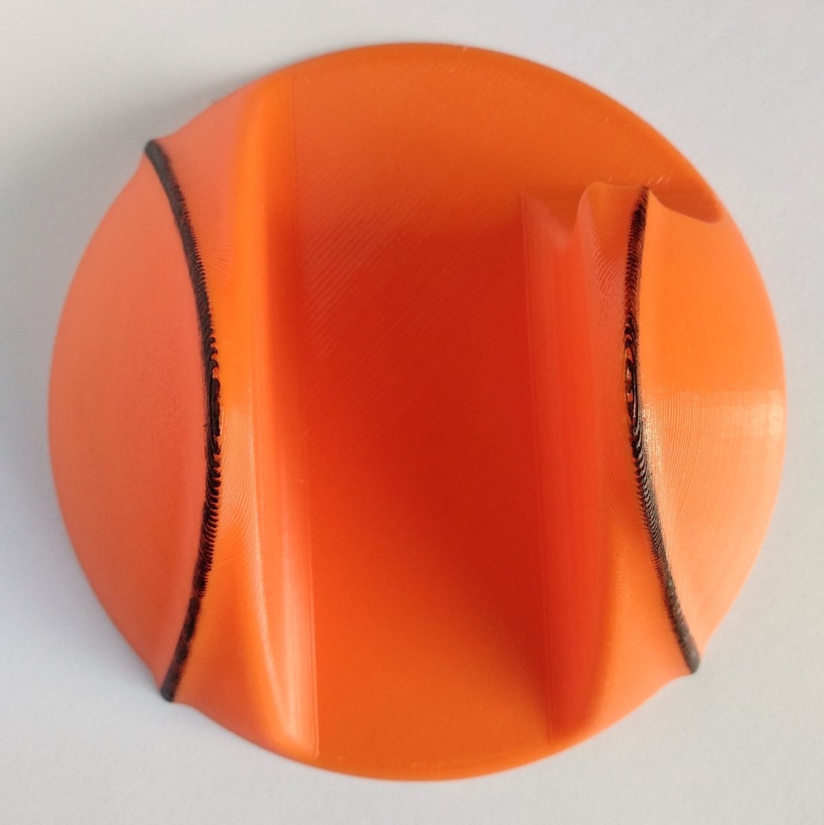 Orange hurley holder for easy storage