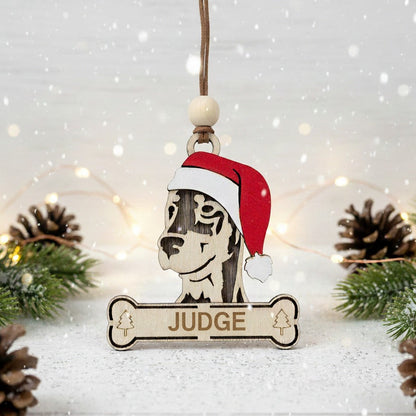 Decorative wooden Christmas ornament with a dobermann wearing a Santa hat