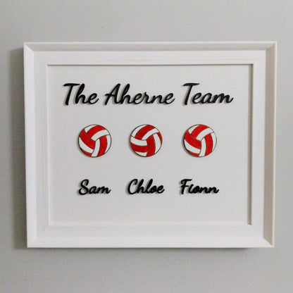 a framed football family artwork
