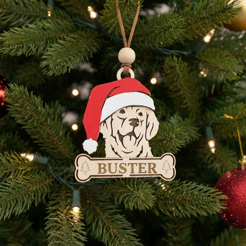 Personalised Christmas tree ornament of a golden retriever dog wearing a Santa hat 