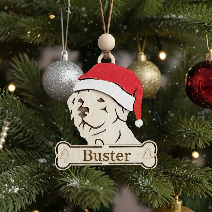 Christmas ornament of a Labrador dog  wearing a santa hat.