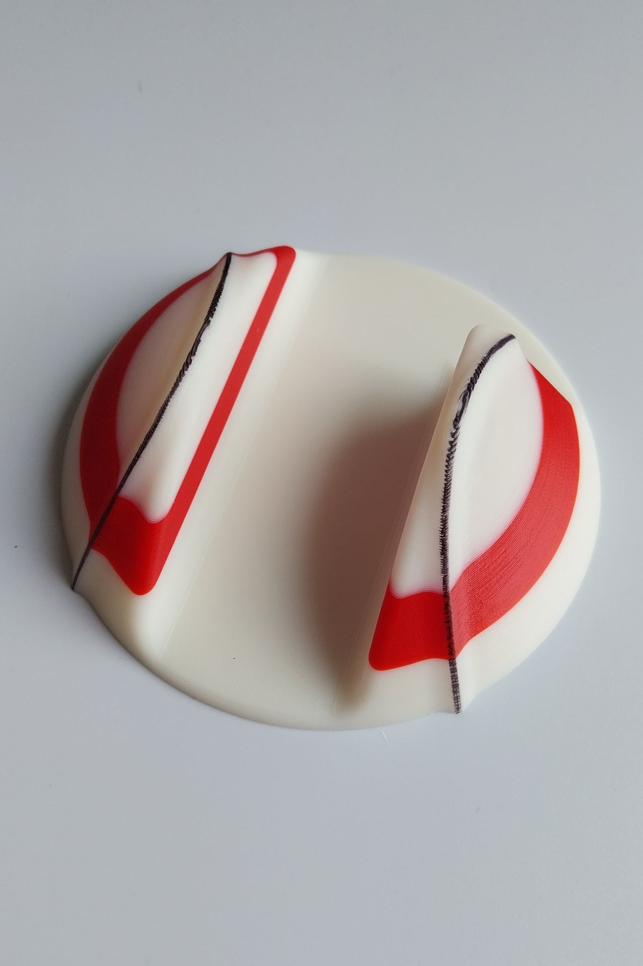 red and white wall mount mount for camogie or hurley equipment