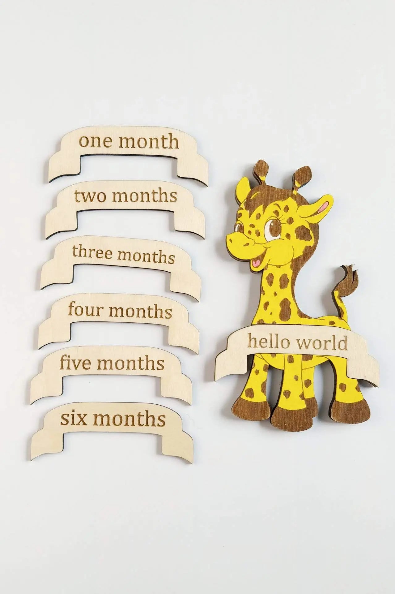 photo prop baby giraffe with milestone month markers